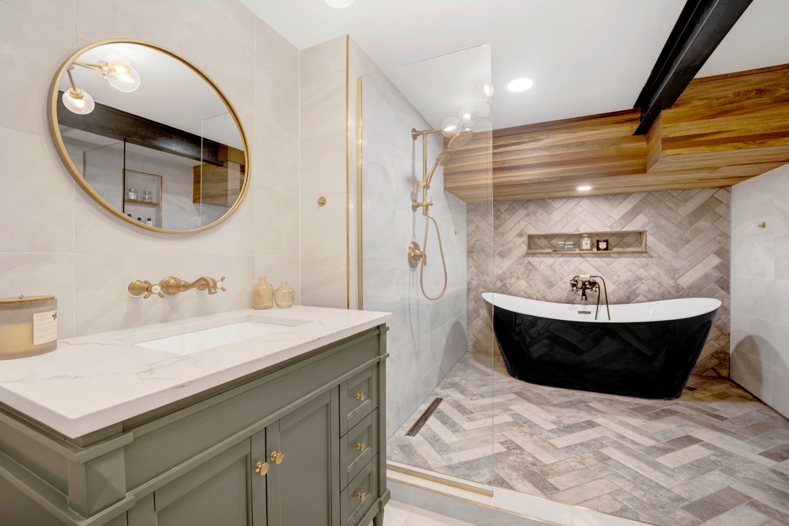 Spa-inspired bathroom with glass enclosure by Turn Key Designs