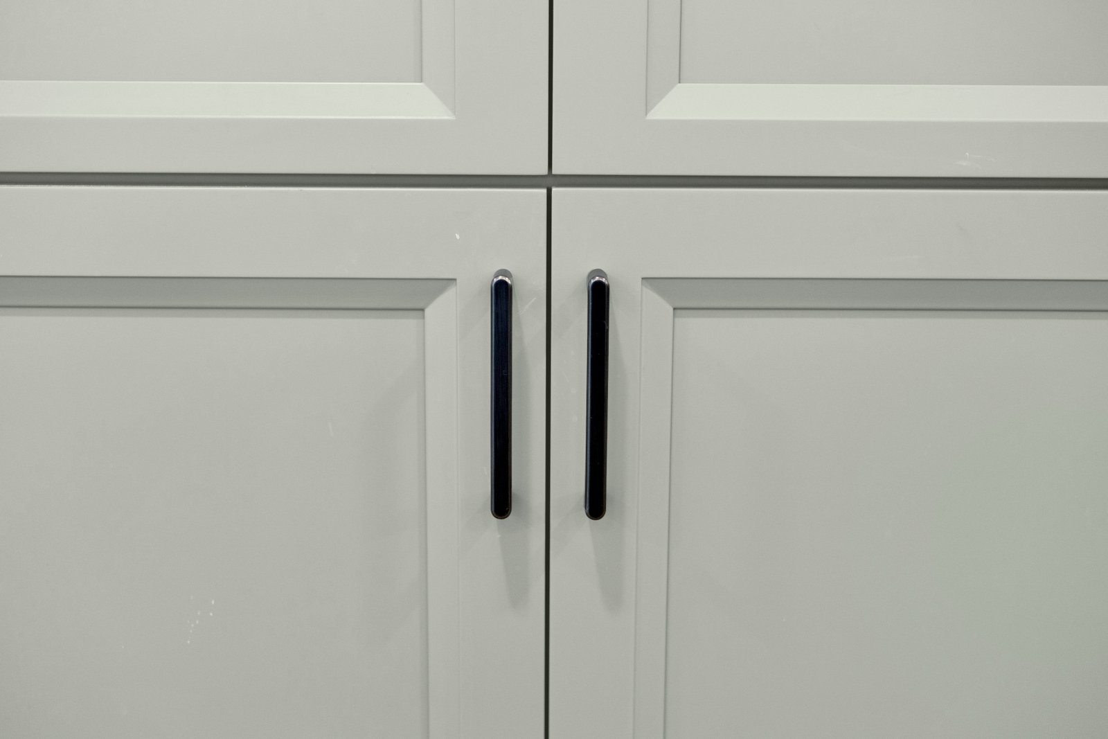 Custom cabinetry with soft-close hardware by Turn Key Designs